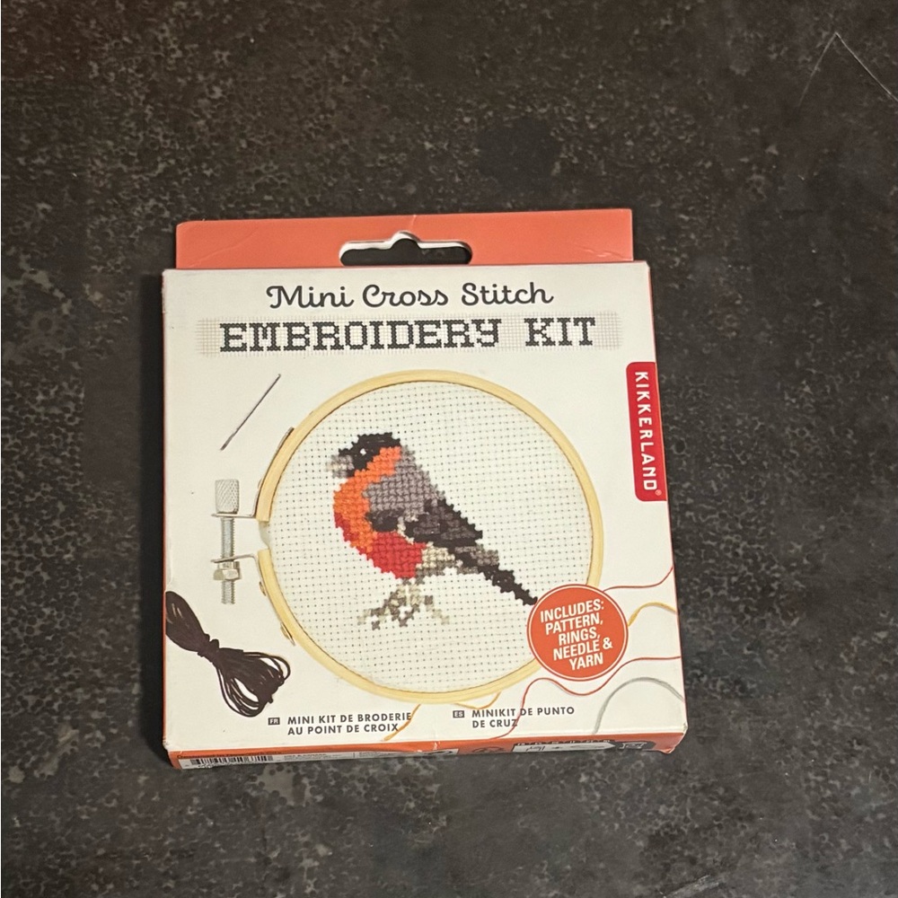 Kikkerland Cross Stitch Kit with Red and Black Bird Design